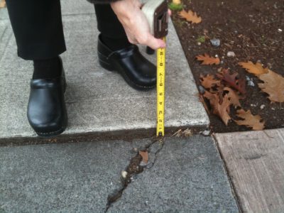 Tape Measure at sidewalk joint