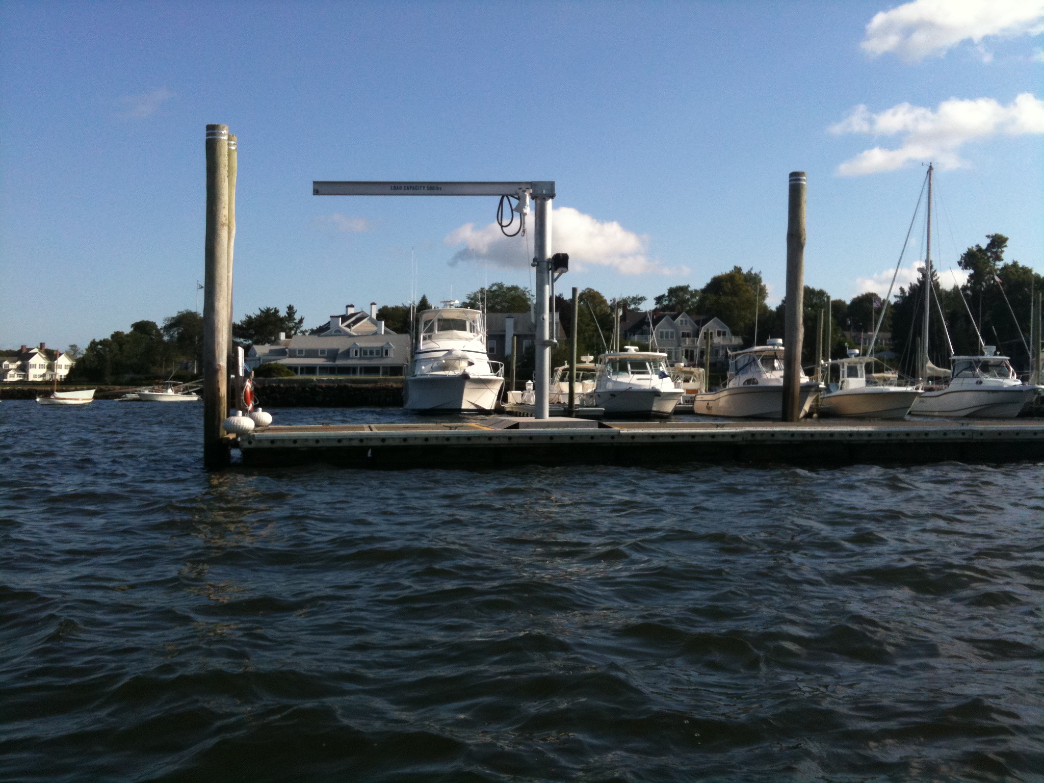 Davit for dock to boat access
